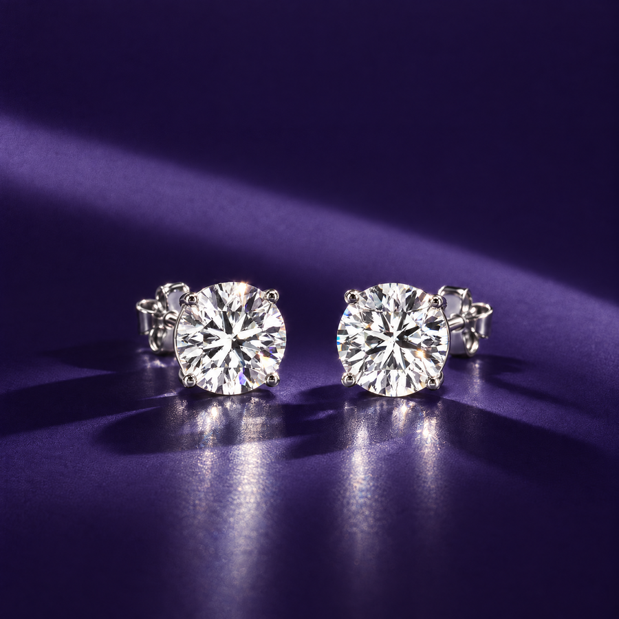 Pair of 4 carat round lab-grown diamond stud earrings in 14K white gold, four-prong settings, indigo background, AI-generated image — DEEVE