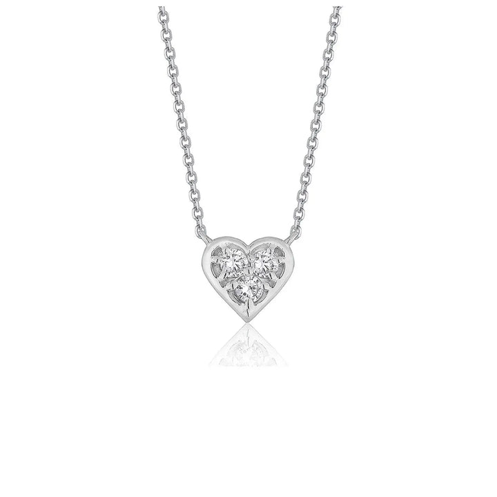 Front view of 14K white gold diamond heart pendant necklace on 16 inch cable chain
