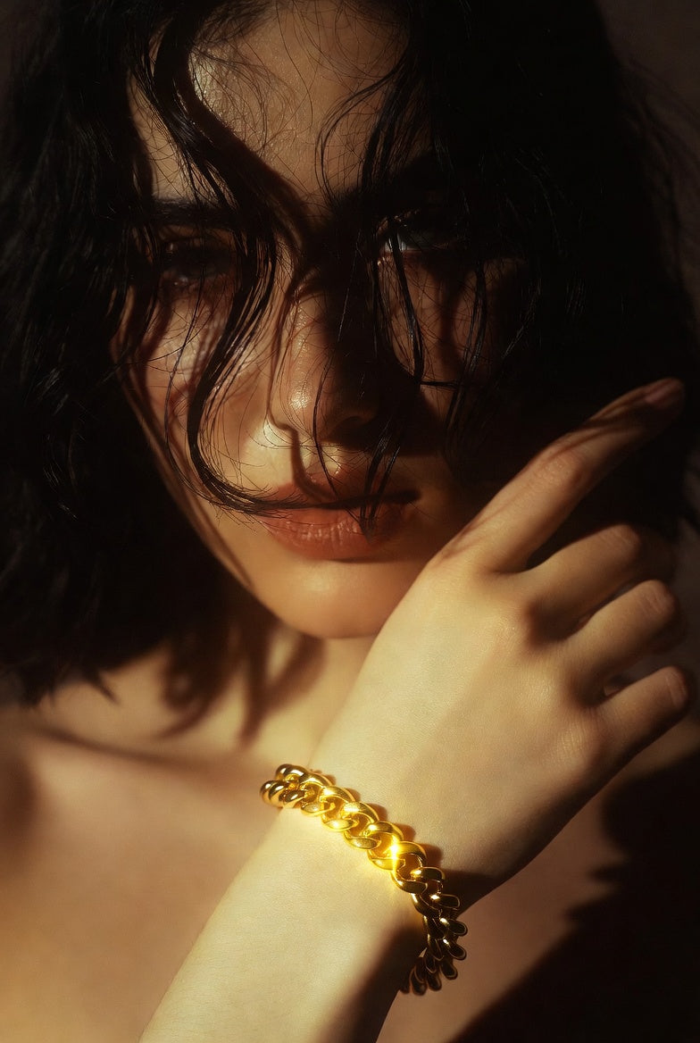 model showcasing 14k gold chain bracelet