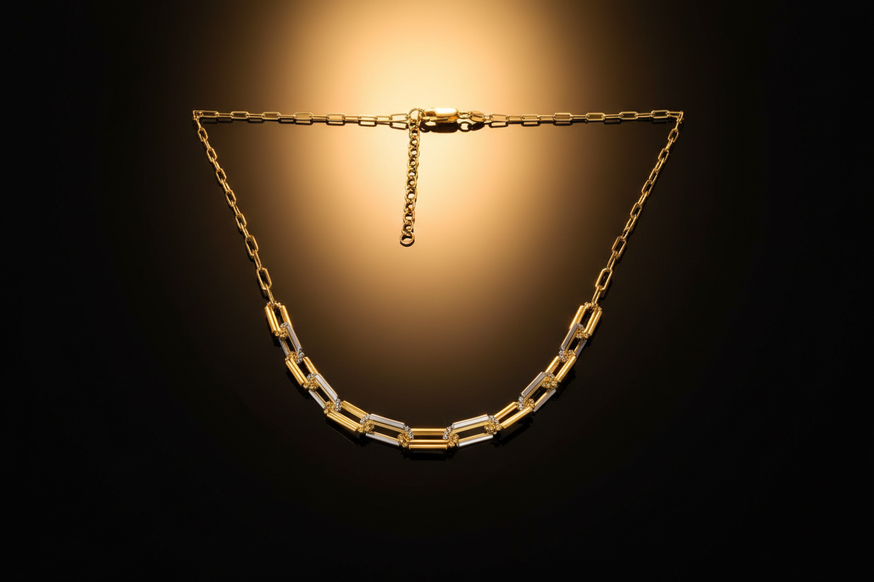 14k yellow Gold adjustable paperclip link Necklaces on dark reflective background and Deeve's logo 