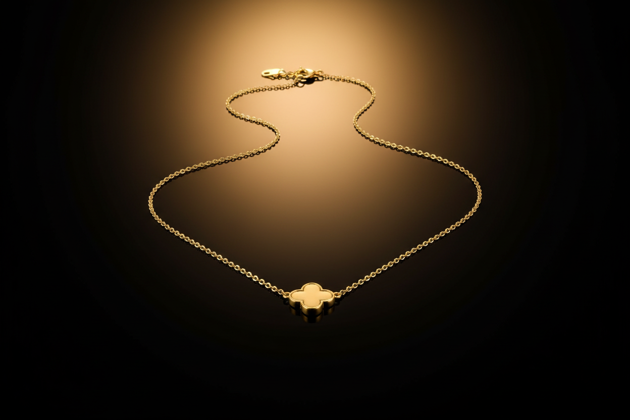 14k gold pendant with natural diamonds on dark reflective background with Deeve's logo