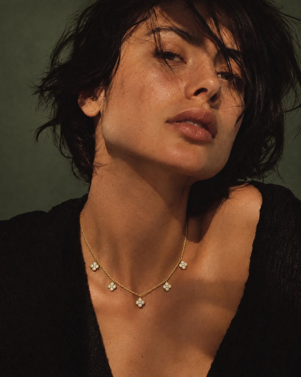 Diamond necklaces: Diamond Flower Necklace in 14K yellow gold worn at the collarbone — AI-generated image — DEEVE
