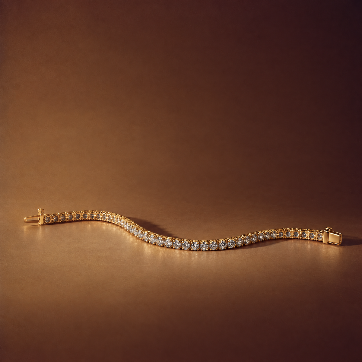 3 carat lab-grown diamond tennis bracelet in 14K yellow gold lying flat on a brown background, AI-generated image — DEEVE