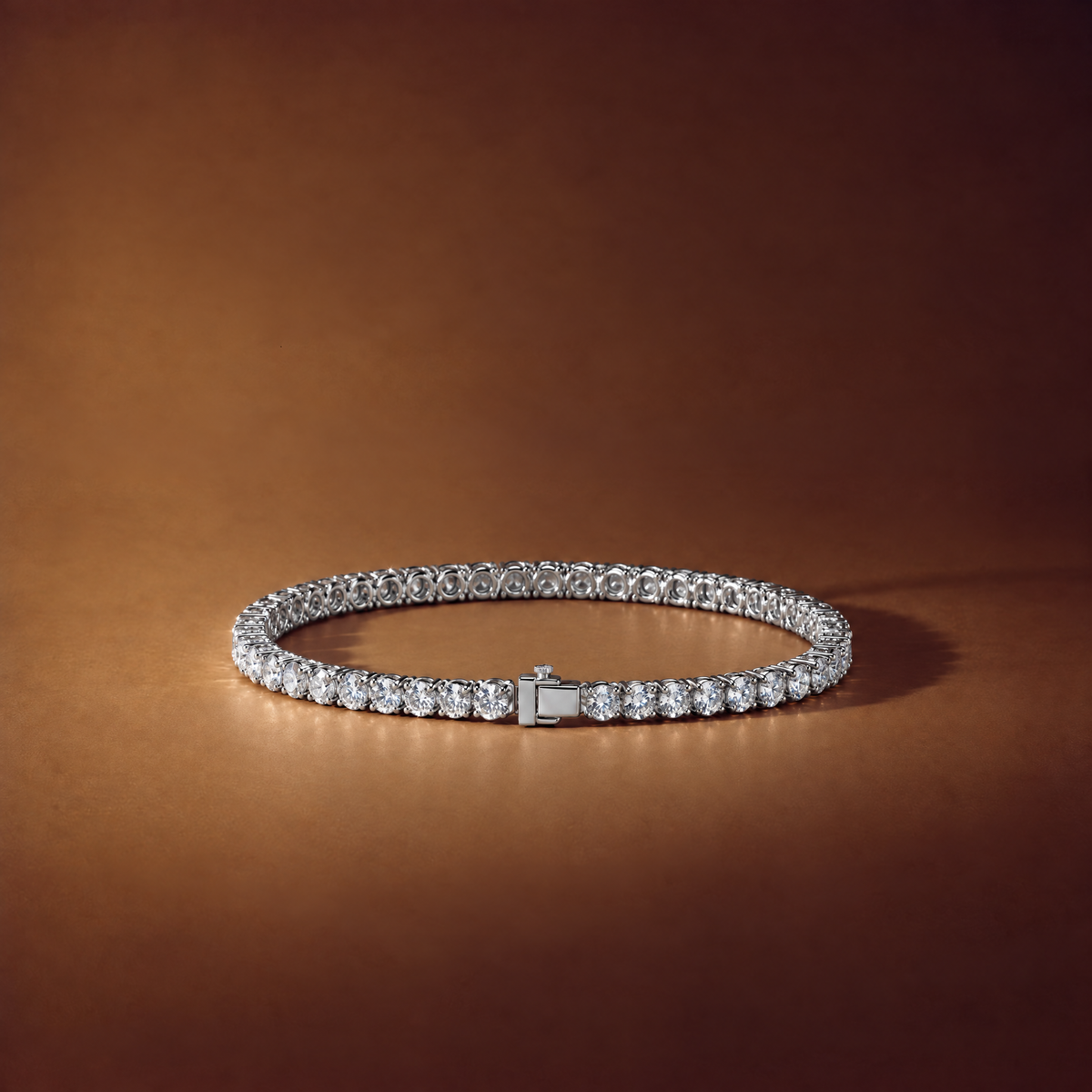 4 carat lab-grown diamond tennis bracelet in 14K white gold lying flat on a brown background, AI-generated image — DEEVE