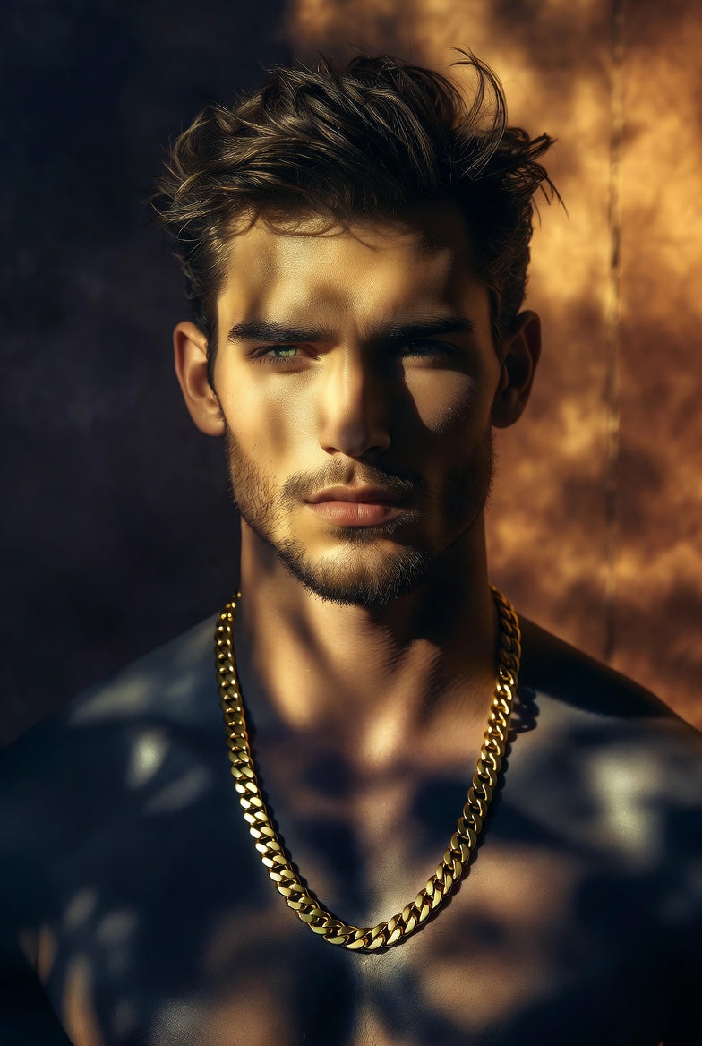 Man wearing a 14k yellow gold cuban link chain necklace from Deeve with a dark, textured background