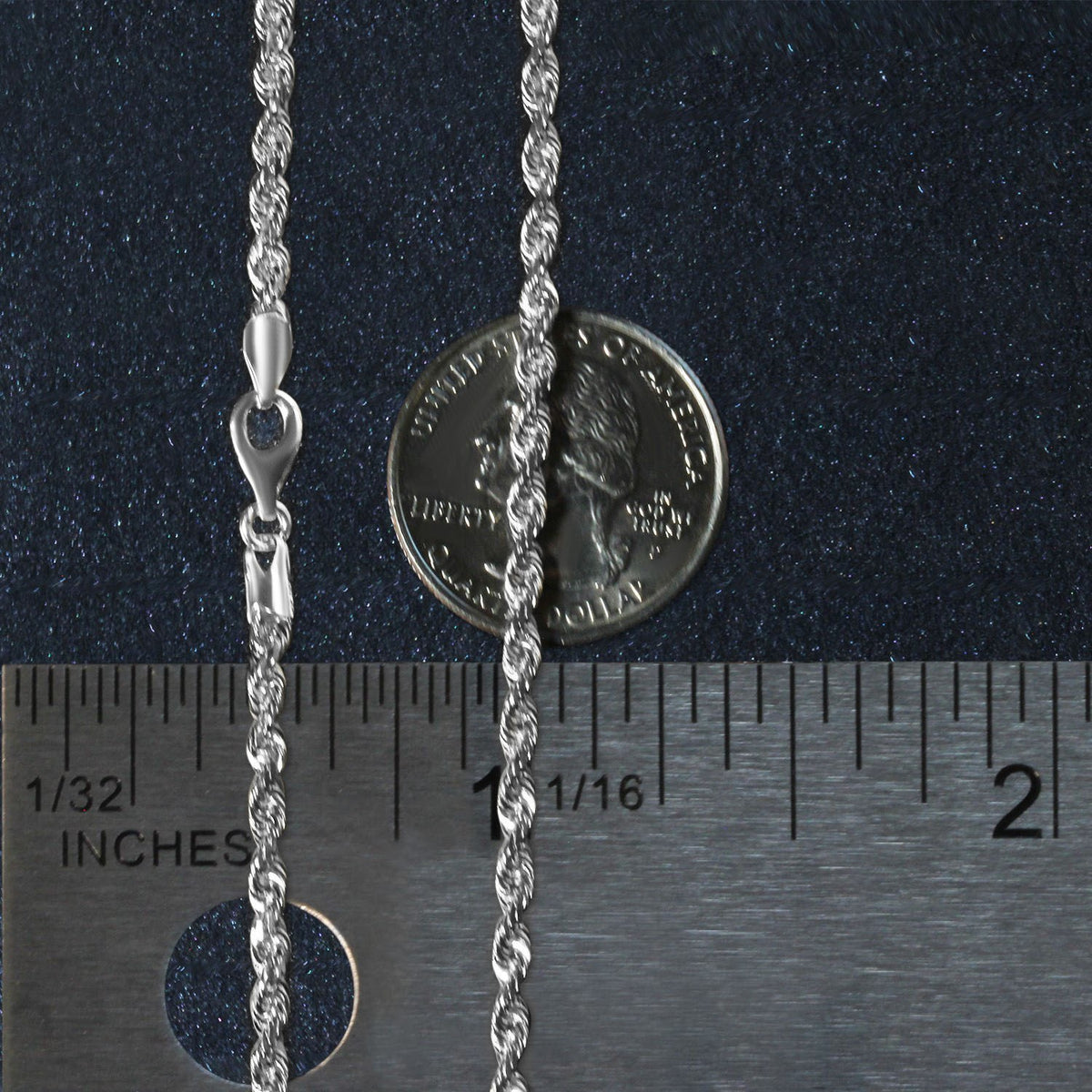 3.00mm rope chain in 14K white gold beside an inch ruler and a coin for scale