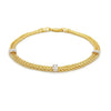 Front view of 14K two-tone wheat chain bracelet with diamond bar stations