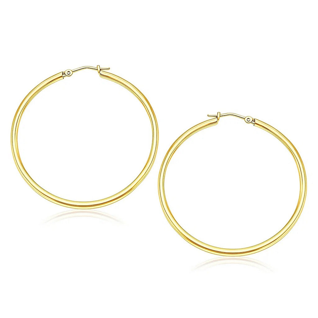 Polished 40mm hoop earrings in 14K yellow gold, 2mm wide, front view of the pair