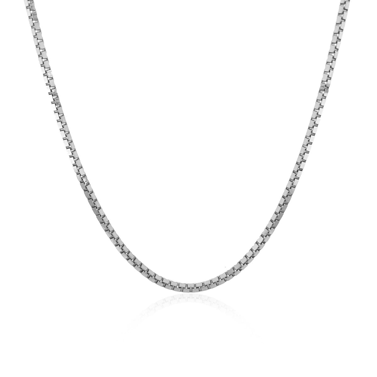 Box chain in 14K white gold hanging in a curve