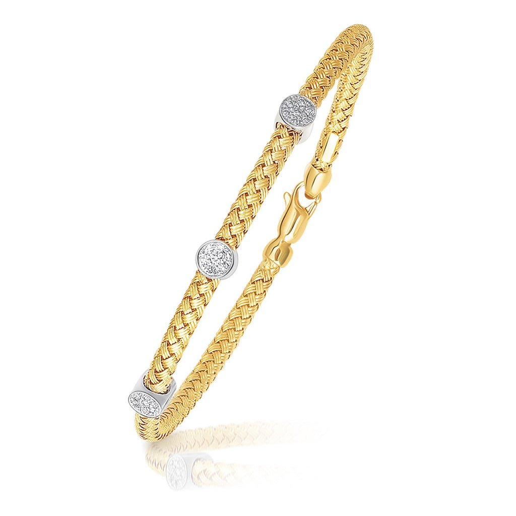 Front view of 14K two-tone basket weave bracelet with diamond stations, 3.8mm