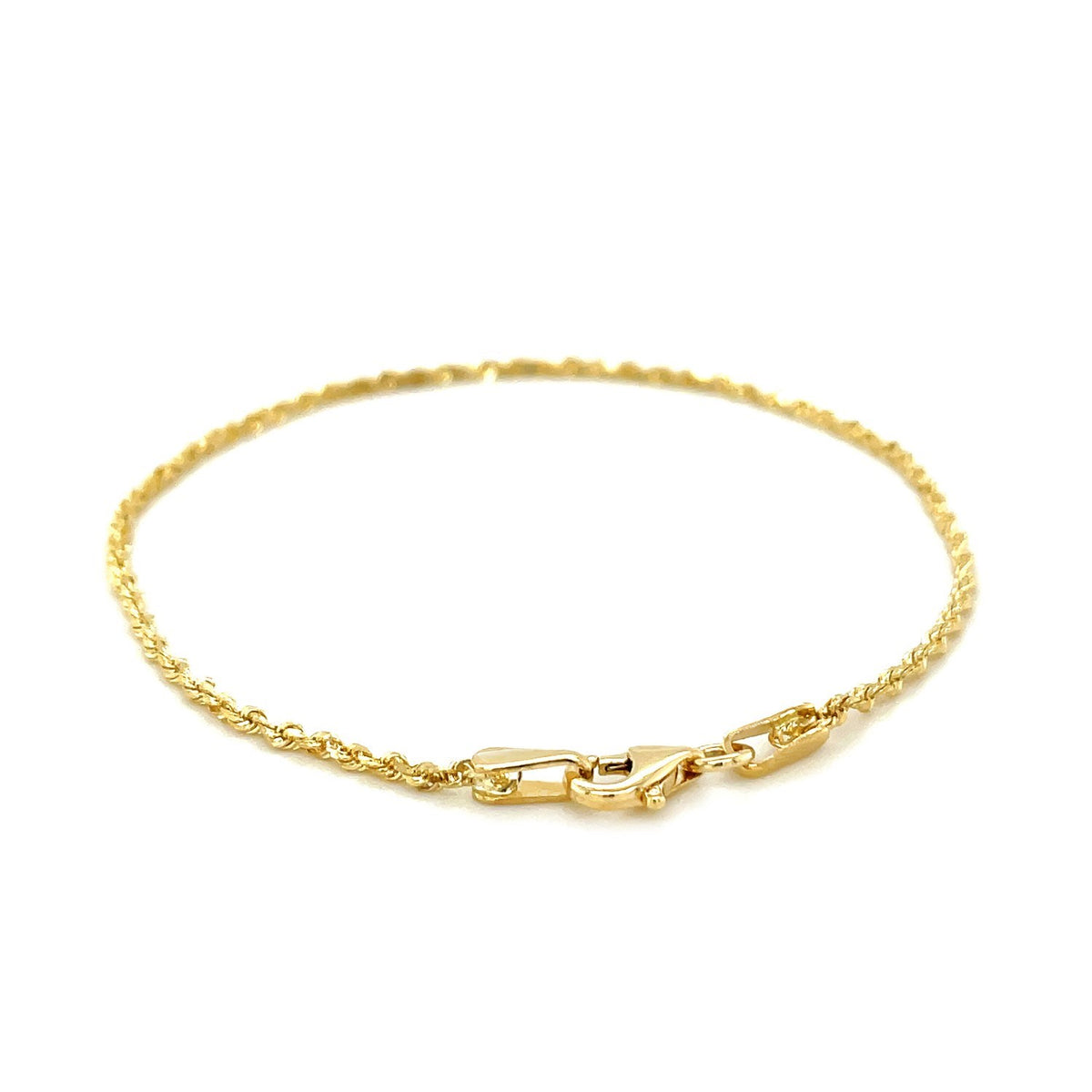 Lobster clasp and end caps on the 14K yellow gold rope bracelet