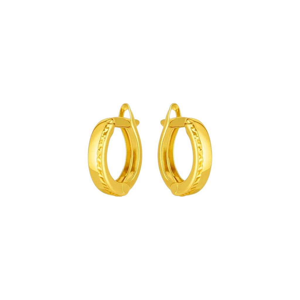 Textured huggies in 14K yellow gold, showing the diamond-cut inner edge