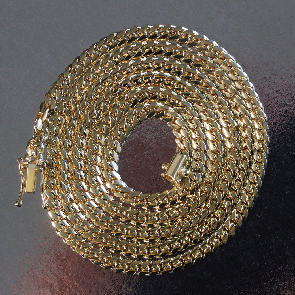 14K yellow gold solid Miami Cuban chain, 4.0mm, coiled to show the links