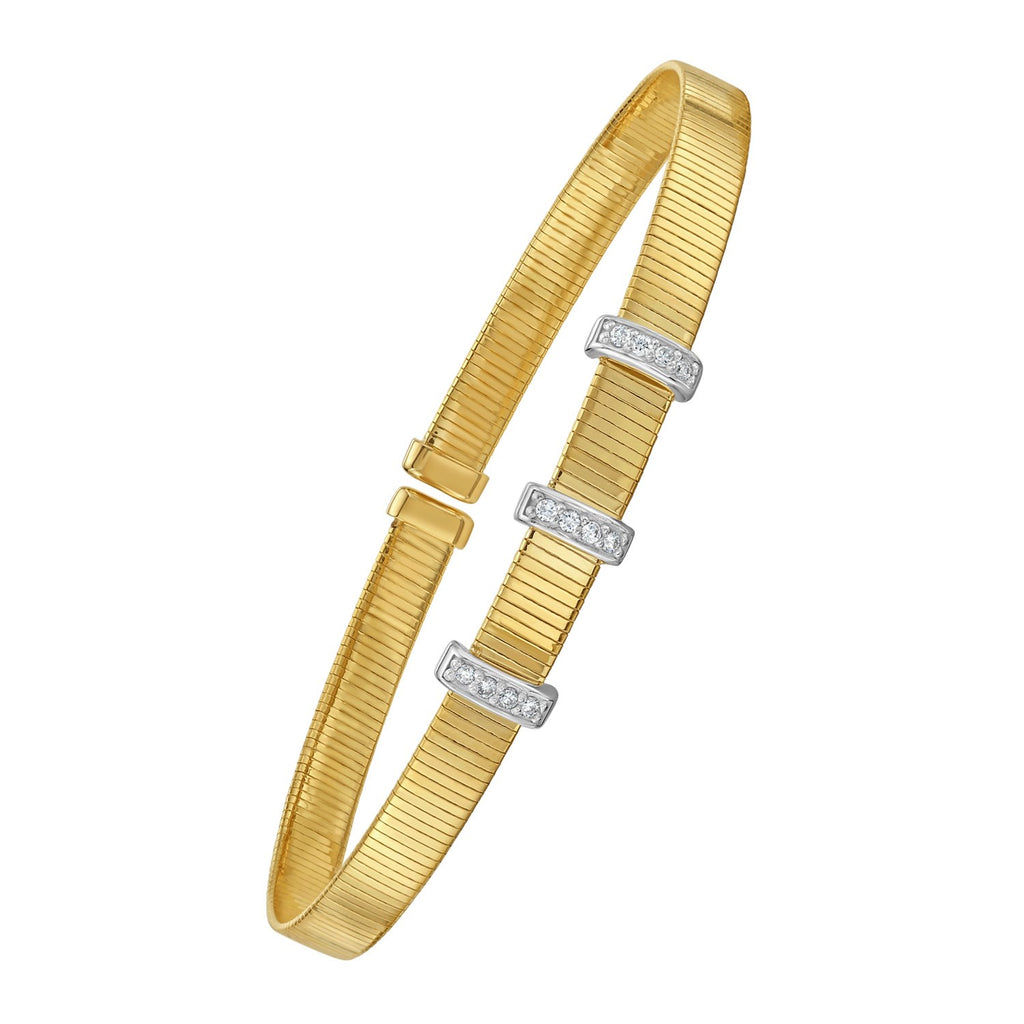 Front view of 14K yellow gold omega cuff bangle with diamond bar station