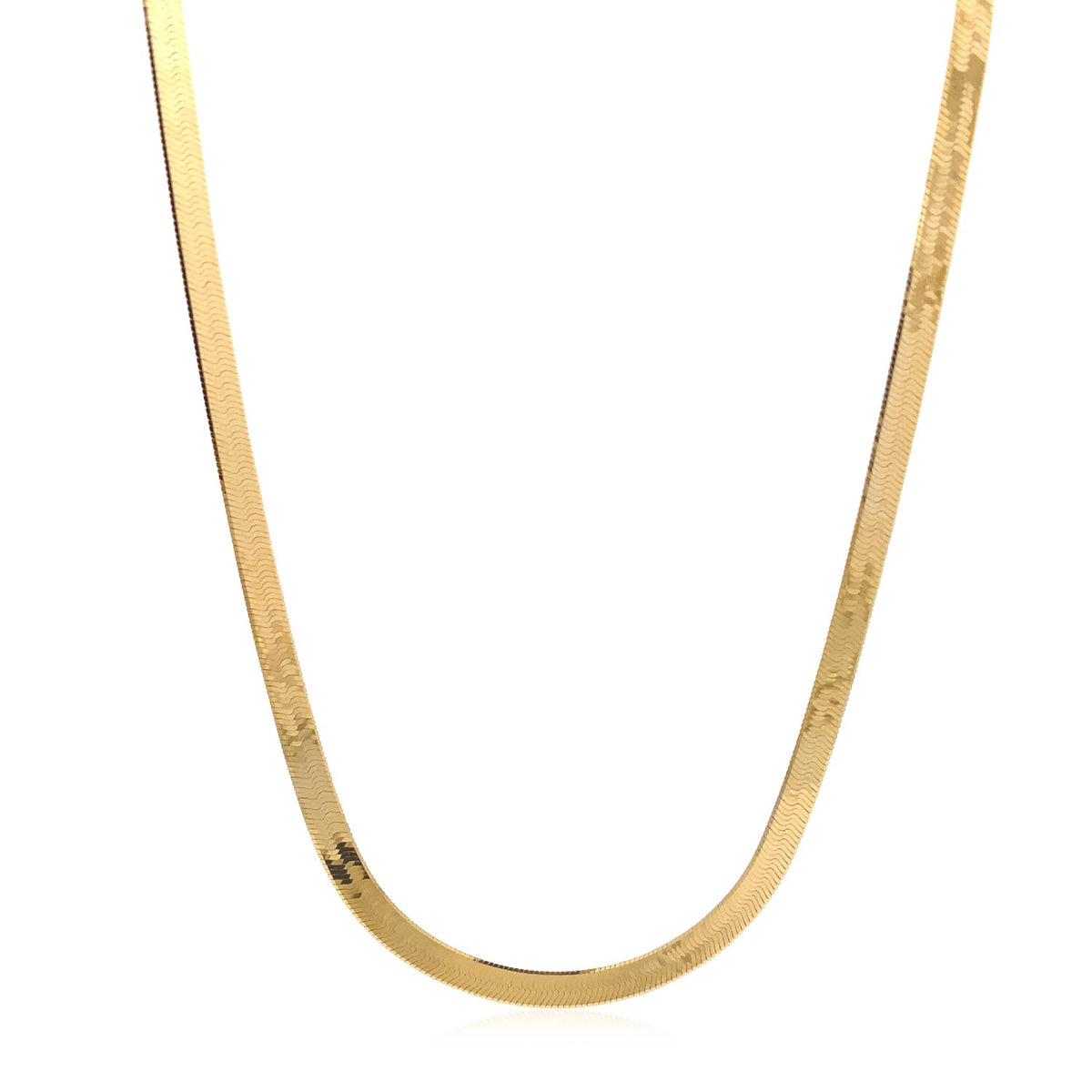 Herringbone chain in 14K yellow gold hanging in a curve