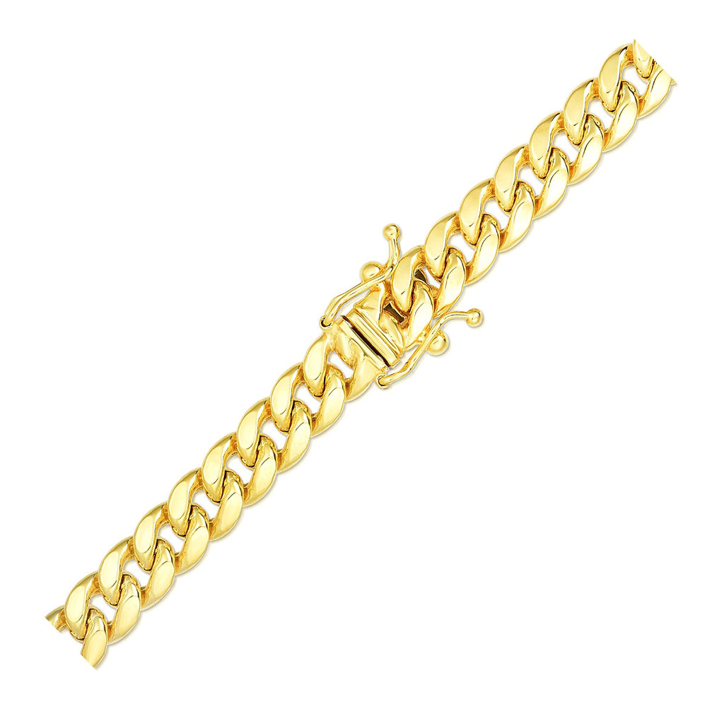 Box clasp with two figure-eight safety latches on the 14K yellow gold Miami Cuban bracelet