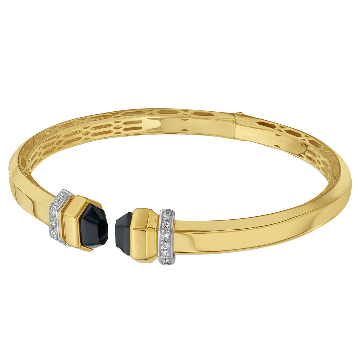 14K yellow gold onyx cuff at an angle, showing the faceted black onyx ends
