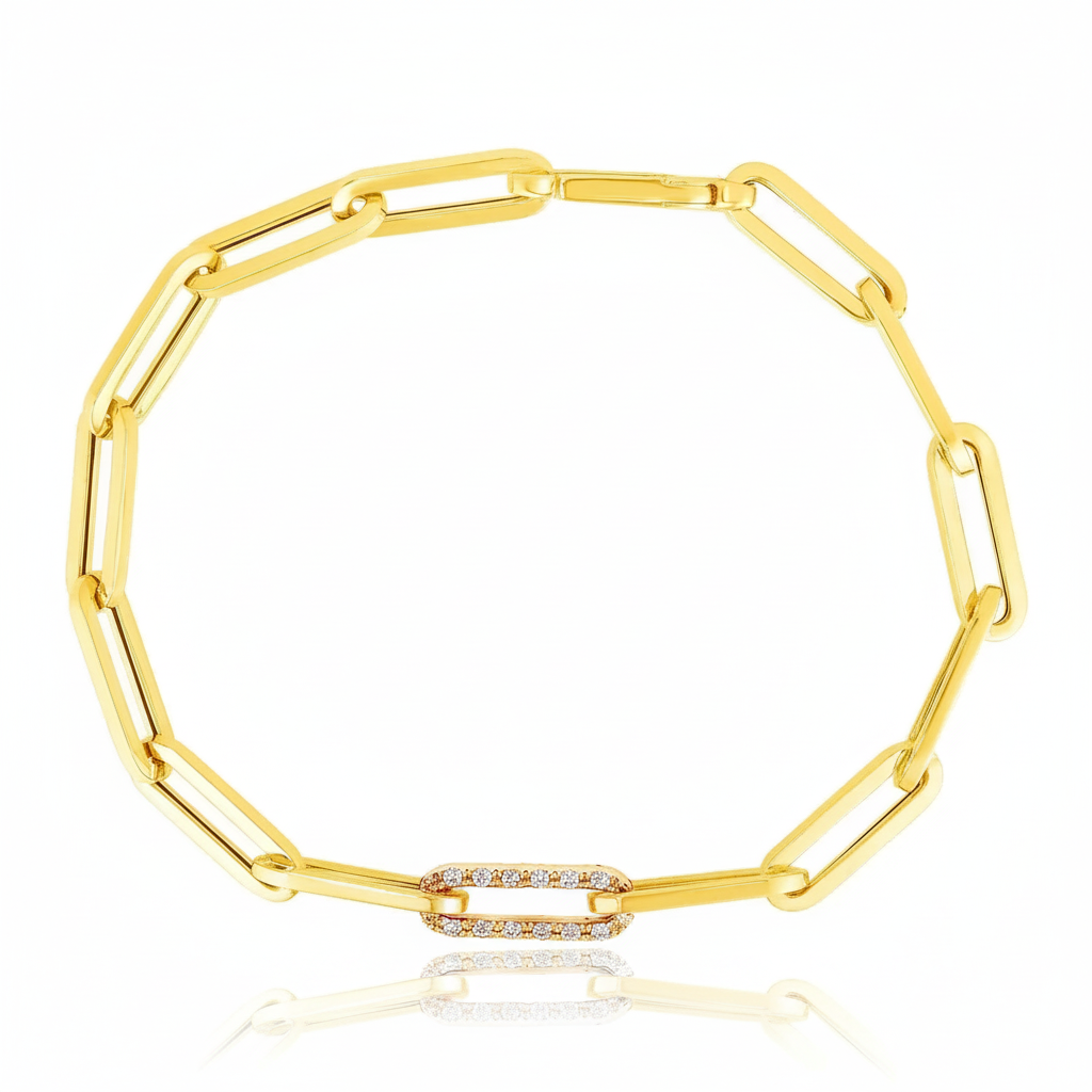Gold bracelet with diamond accents on a white background