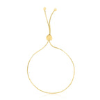 Front view of 14K yellow gold adjustable lariat heart bracelet
