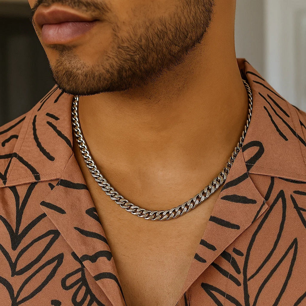 5.50mm Miami Cuban chain in 14K white gold worn with a patterned open shirt