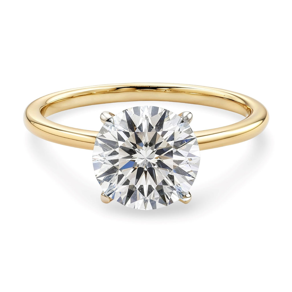 Close-up of 4-prong solitaire setting in 14K yellow gold