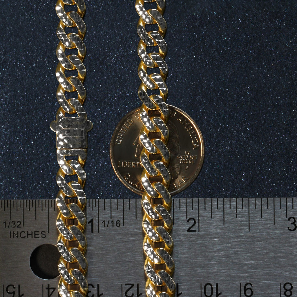 8.00mm two-tone Miami Cuban chain beside an inch ruler and a coin for scale