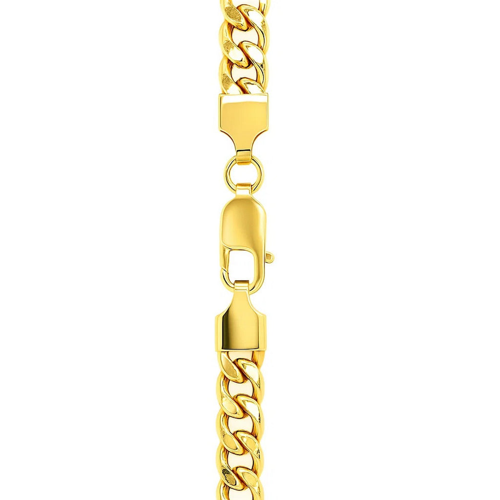 Lobster clasp between two end caps on a 14K yellow gold Miami Cuban chain