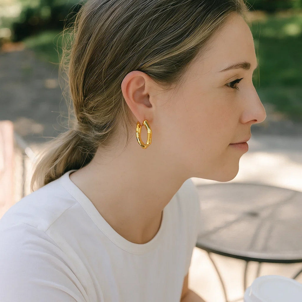 Bamboo hoop in 14K yellow gold worn, side profile