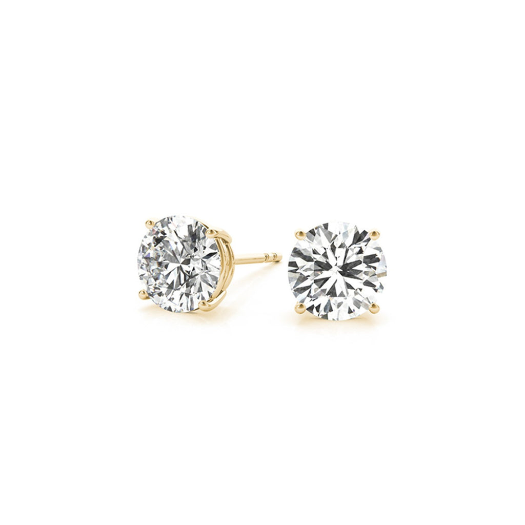 Angled view of 4.00 ct IGI certified round-cut lab-grown diamond stud earrings in 14K yellow gold — DEEVE