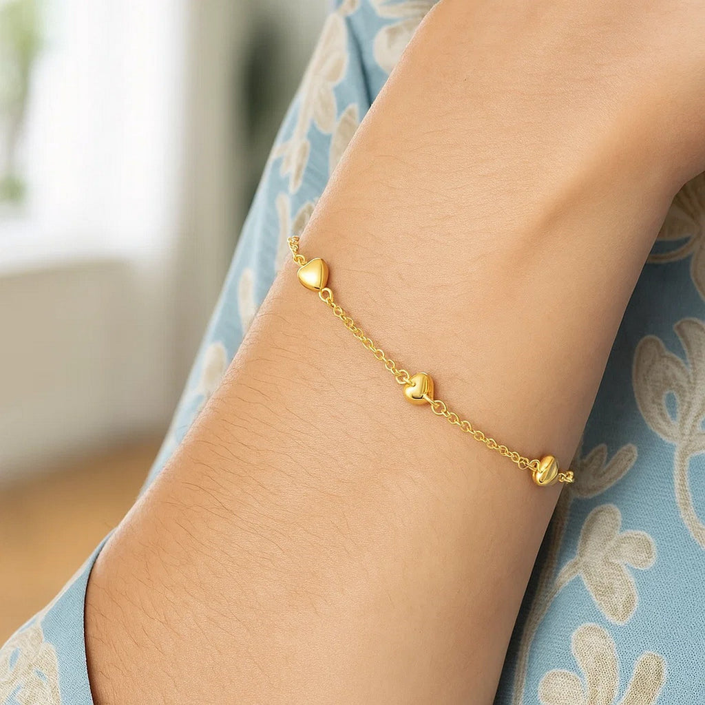 14K Yellow Gold Rolo Chain Bracelet With Puffed Heart Stations