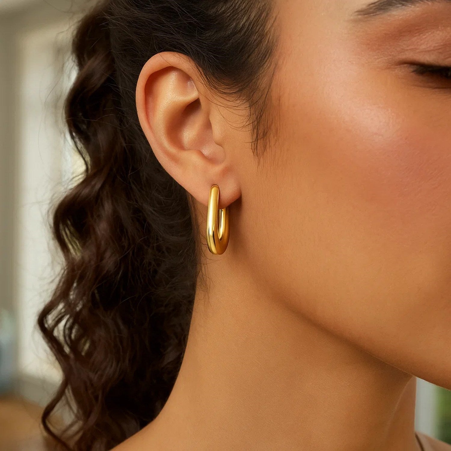 14K Yellow Gold Graduated Oval Hoop Earrings 20.00 mm