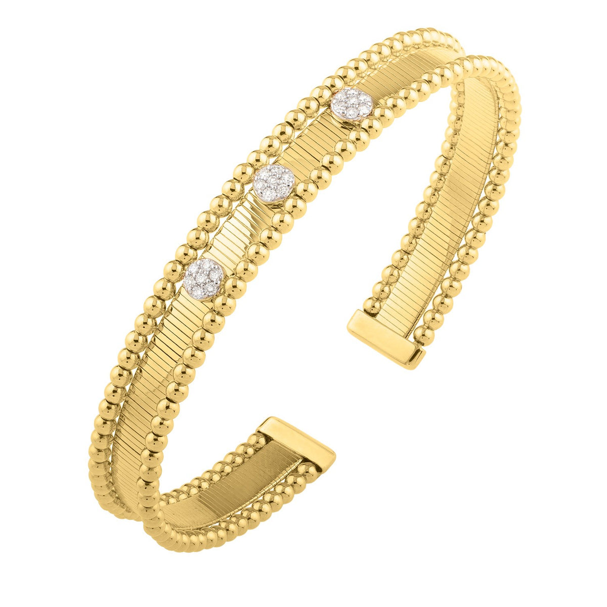 Diamond pallina cuff in 14K yellow gold with three round natural diamond clusters on a ribbed band