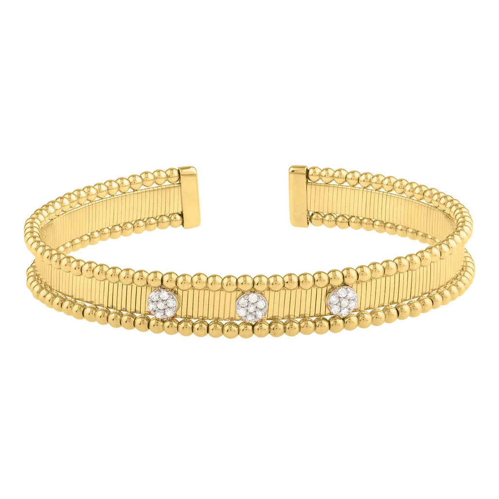 Front view of the 14K yellow gold pallina cuff with its three diamond clusters