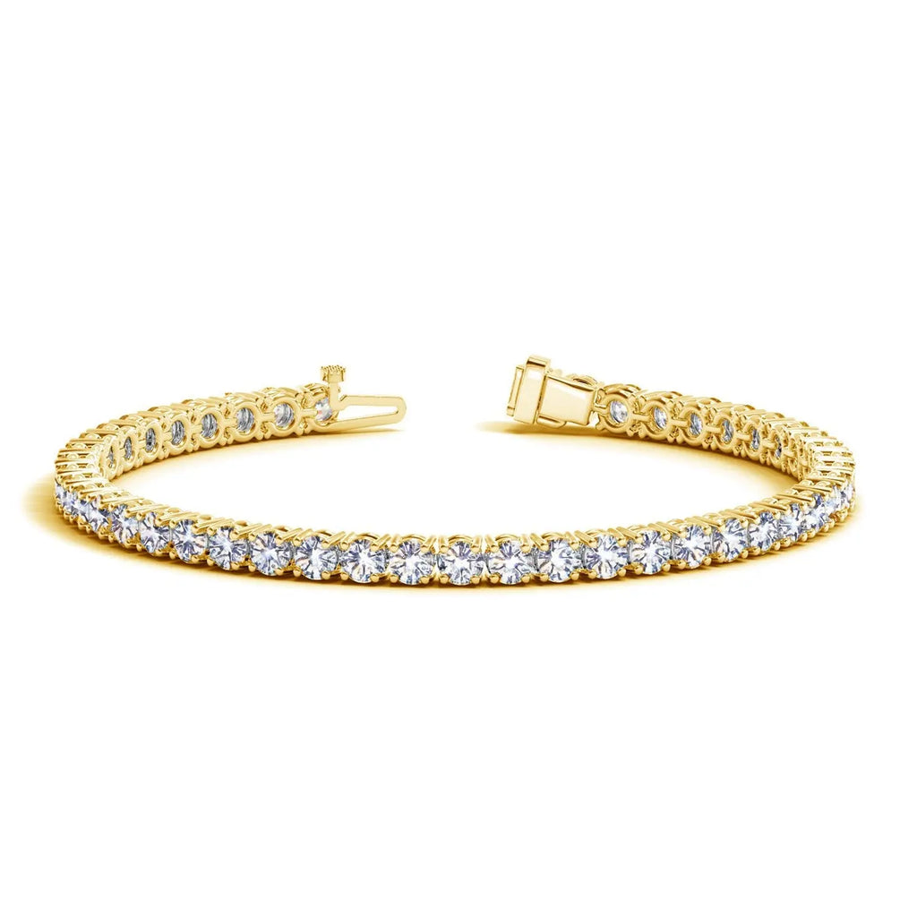 Front view of 14K yellow gold lab-grown diamond tennis bracelet with round diamonds in four-prong setting and box clasp with hidden safety